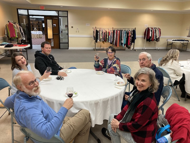 the shop your neighbor volunteers enjoying the day